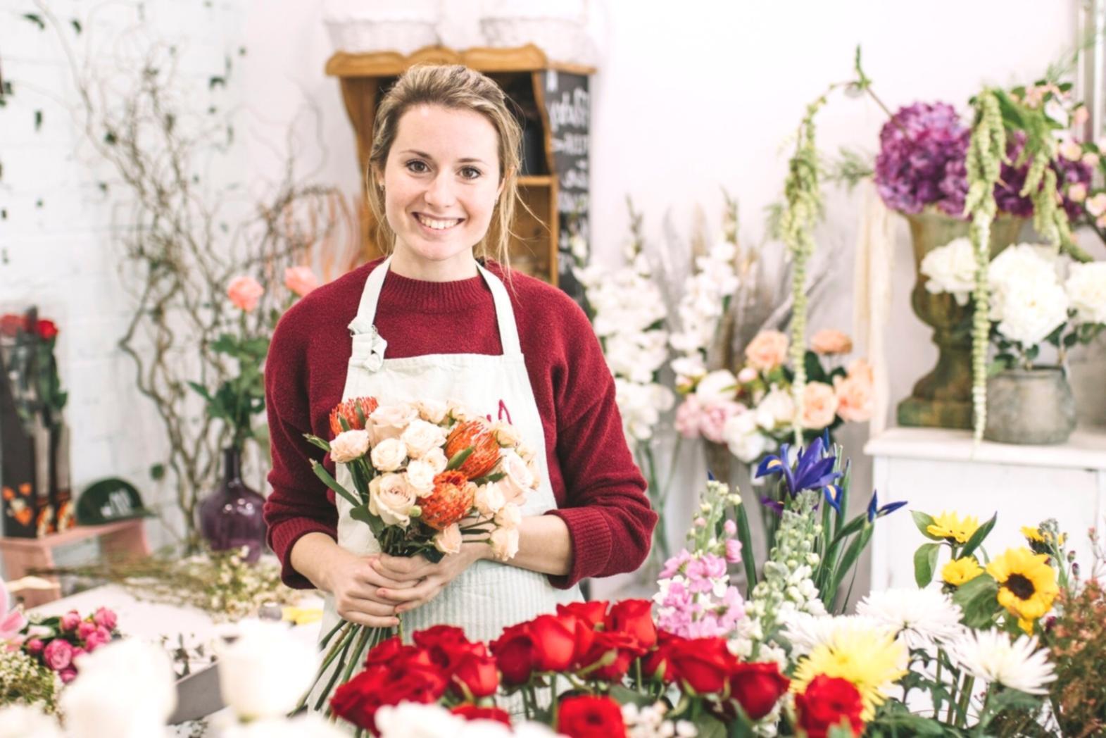 Students collaborating on game development projects in modern learning environment